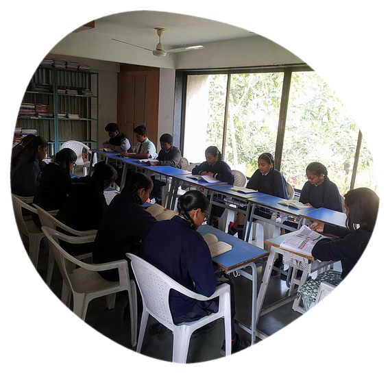 Students reading in the school library