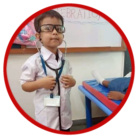 A pre-primary child dressed as a doctor on role-play day