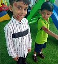 Pre-primary friends on the play lawn
